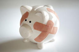 bandaged piggy bank