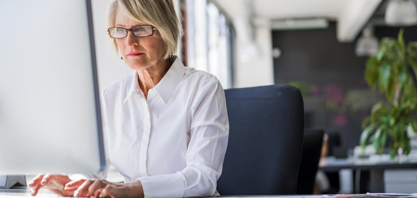 employer working at desk